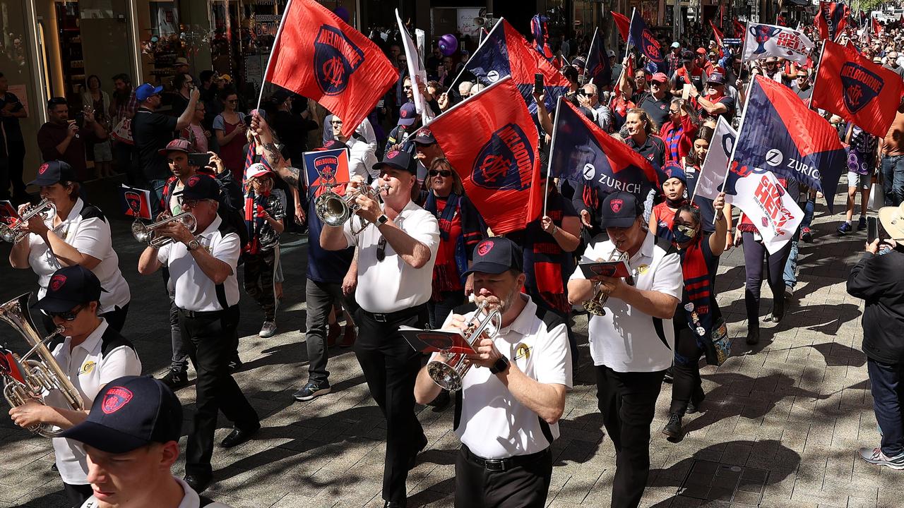 Demons supporters march in the People's Parade ahead of the 2021 AFL grand final in Perth. Picture: Getty Images