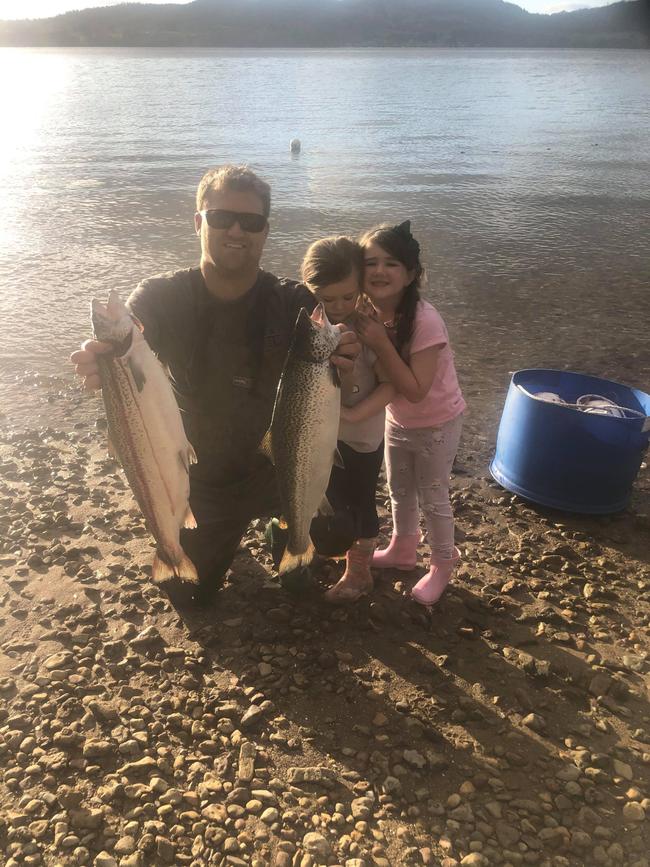 James Robinson, along with his daughters Alira and Callie, caught these great Atlantic salmon in Deep Bay, Cygnet. Photo: Supplied