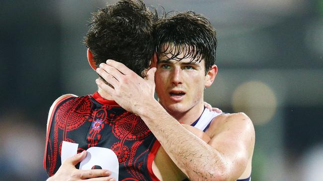 Andrew Brayshaw and Angus Brayshaw embrace after the match. Picture: Getty Images