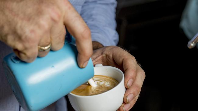 Best coffee winner - Lakeview Espresso at Burleigh Waters. Archaeus Adidam making a swan. Picture: Jerad Williams