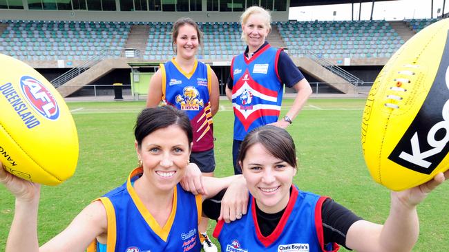 The girls are pumped for the start of the Townsville AFL girls comp starting in 2013. (front L-R) Christine Cocker (Lions) and Rachel Simmons (Bulldogs) with at rear (L) Breanna Koenen (Lions) and (R) Kath Newman (Regional Manage AFL QLD).