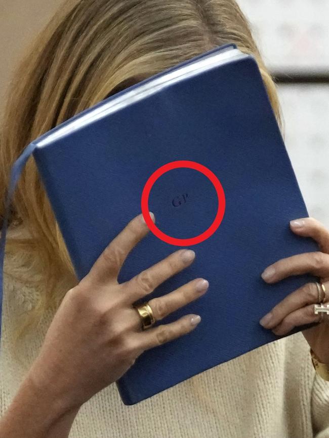 Paltrow’s initials ‘GP’ are monogrammed on the book. Picture: Rick Bowmer-Pool/Getty Images