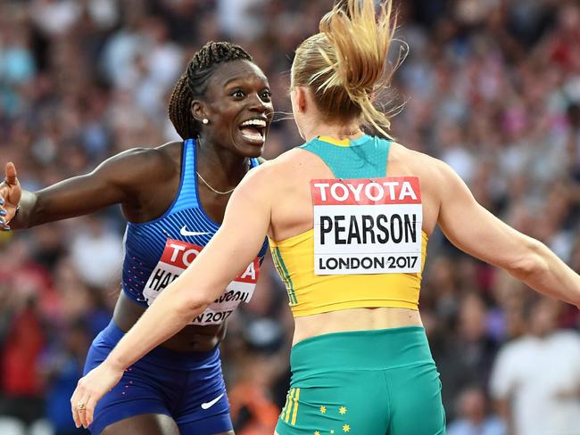 Dawn Harper Nelson rushes over to congratulate Sally Pearson.