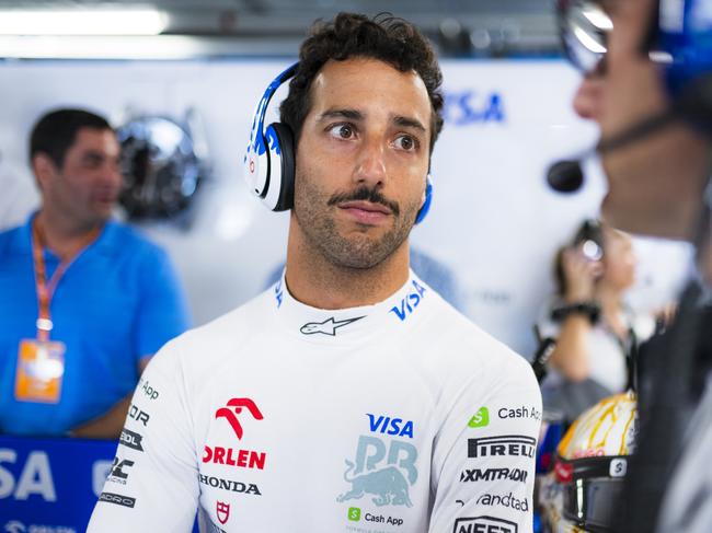 MONTREAL, QUEBEC - JUNE 07: Daniel Ricciardo of Australia and Visa Cash App RB talks with race engineer Pierre Hamelin in the garage during practice ahead of the F1 Grand Prix of Canada at Circuit Gilles Villeneuve on June 07, 2024 in Montreal, Quebec. (Photo by Rudy Carezzevoli/Getty Images)