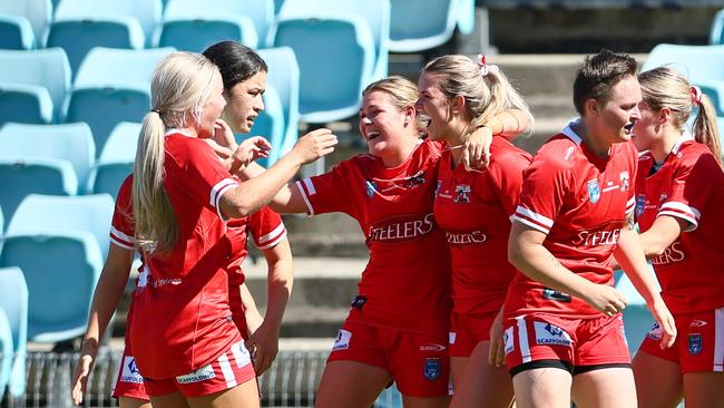 The Illawarra Steelers celebrating a try against the Rabbitohs in round one. Photo: Denis Ivaneza