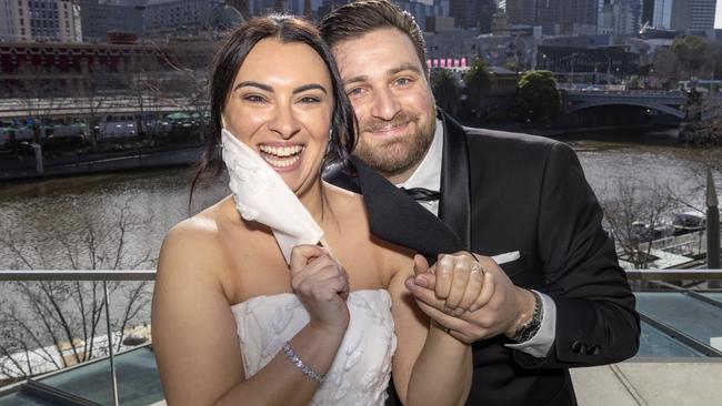 Connie Carusello and fiance John Barbuscio will marry soon, with the bride wearing a beaded mask made to match her dress. Picture: David Geraghty