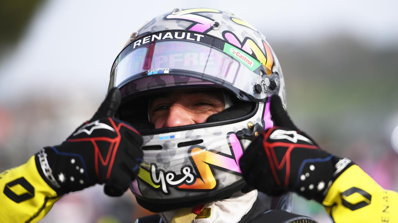 Ricciardo’s smile is so big you can see it through his helmet.