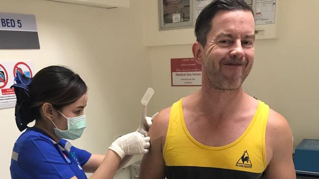 Stephen Brook and his first rabies shot in Thailand.