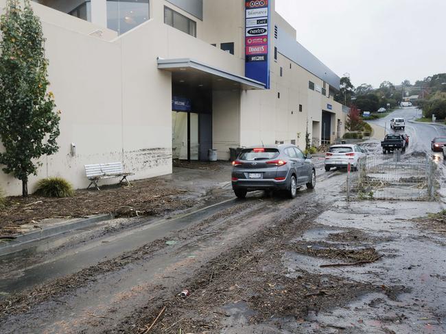 Flood damage at Channel Court shopping centre in Kingston. The automatic doors were washed off their tracks in the flooding. Picture: MATHEW FARRELL