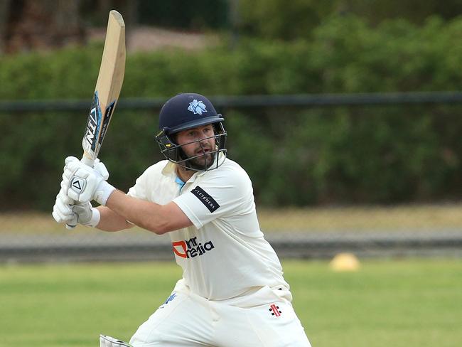 Run machine Chris Weeks sends another ball to the boundary. Picture: Hamish Blair