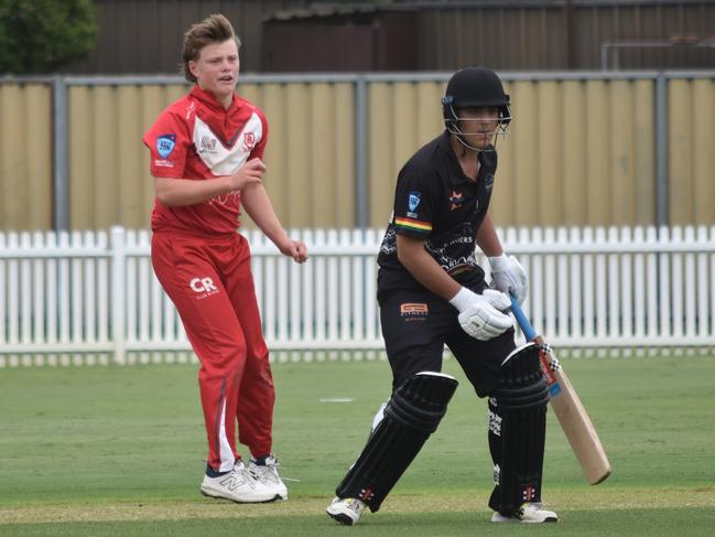 Ronan O'Neill (left) and Ryan Burfitt watch on. Picture: Sean Teuma