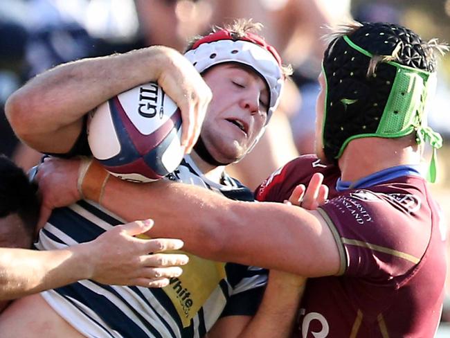 Queensland Rugby Union grand final at Ballymore: FIRST GRADE GRAND FINAL - Brothers vs. University (maroon).Photo of Fraser McRreight tackled.18th August 2019 Brisbane AAP Image/Richard Gosling