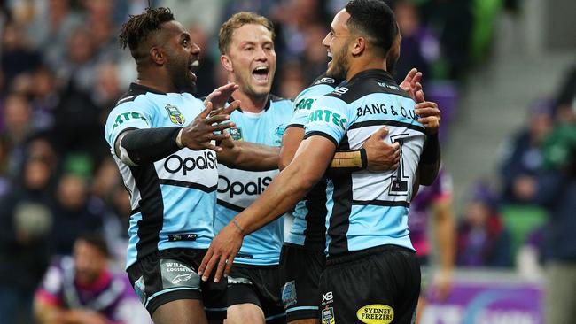 Valentine Holmes celebrates a try with his Sharks teammates. Picture: Getty Images