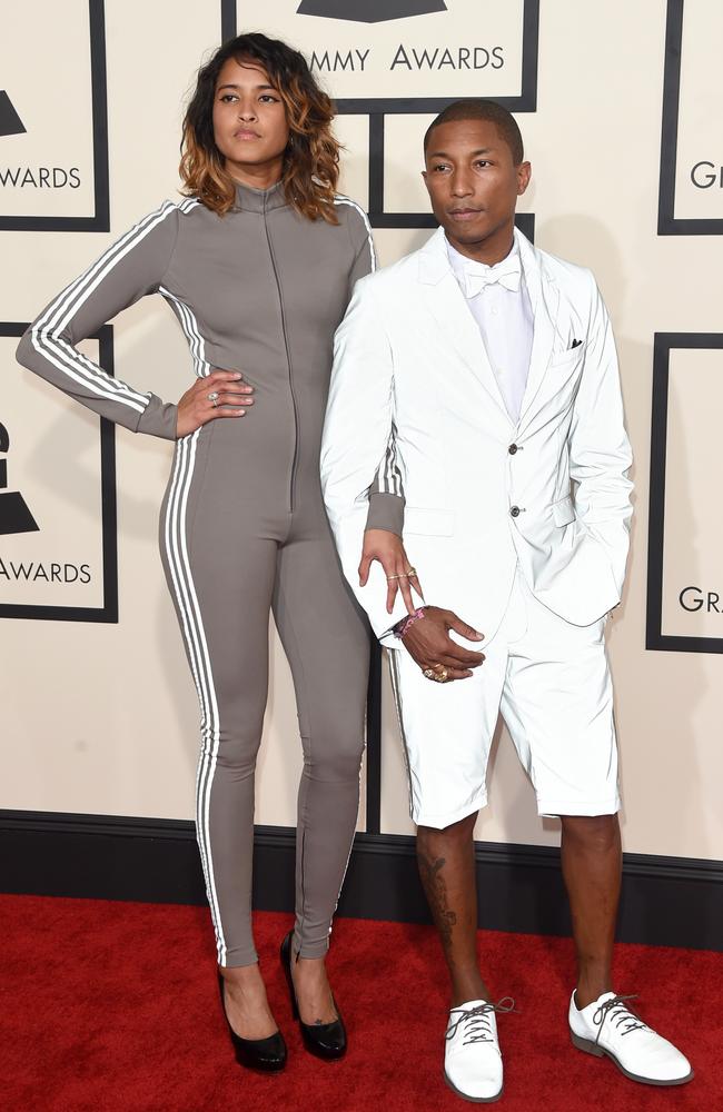 The eternally young Pharrell could just still be growing, but for now, the 175cm music legend falls short to his wife Helen Lasichanh’s 180cm height. Picture: Getty