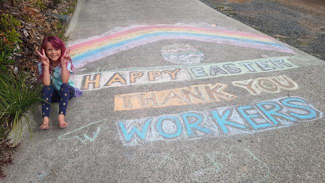 Jasmine Harper, 6, is spreading her "Jazzy Sunshine" in a message of gratitude to workers this Easter. Picture: GWEN HARPER.