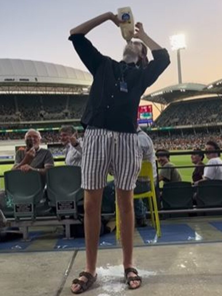 Milk-skolling at the cricket at Adelaide Oval Picture: Supplied