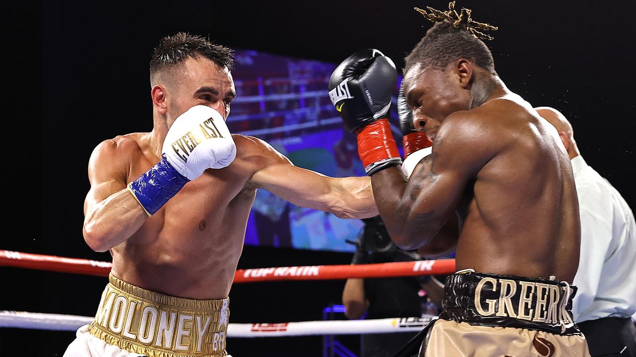 Jason Moloney and Joshua Greer Jr exchange punches. (Photo by Mikey Williams/Top Rank Inc via Getty Images)