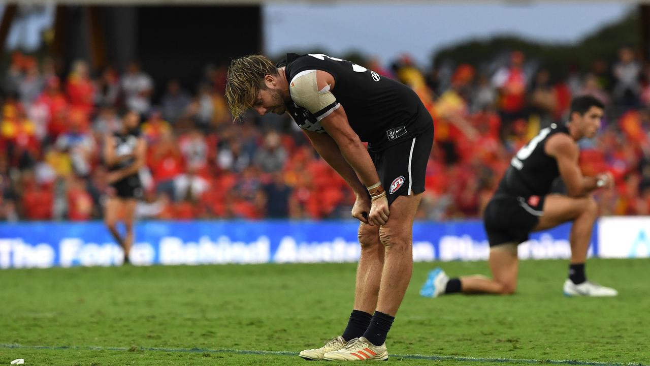 Dale Thomas of the Blues reacts after Jack Bowes of the Suns kicked the winning goal during the Round 4 AFL match between the Gold Coast Suns and the Carlton Blues at Metricon Stadium on the Gold Coast, Sunday, April 14, 2019. (AAP Image/Dave Hunt) NO ARCHIVING, EDITORIAL USE ONLY