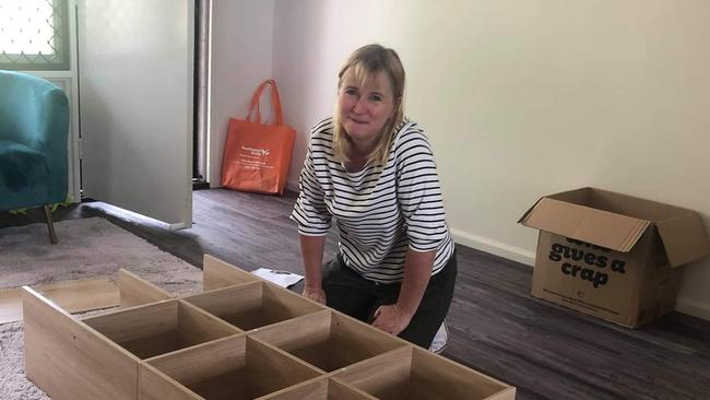 A volunteer setting up a home in the Northern Rivers region. Picture: Newcastle Permanent Charitable Foundation