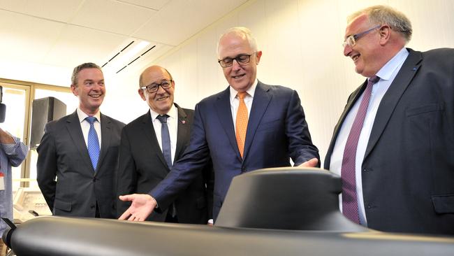 Then prime minister Malcolm Turnbull with. left to right, then defence industry minister Christopher Pyne, French defence minister Jean-Yves Le Drian and French Submarine company CEO Herve Guillou after the 2016 deal was signed. Picture: AAP