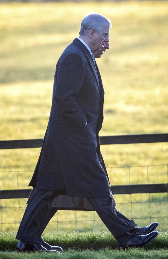 Britain's Prince Andrew, foreground, and Prince Charlies en route to Mary Magdalene Church in Sandringham, Norfolk, on Christmas Day. Picture: AFP