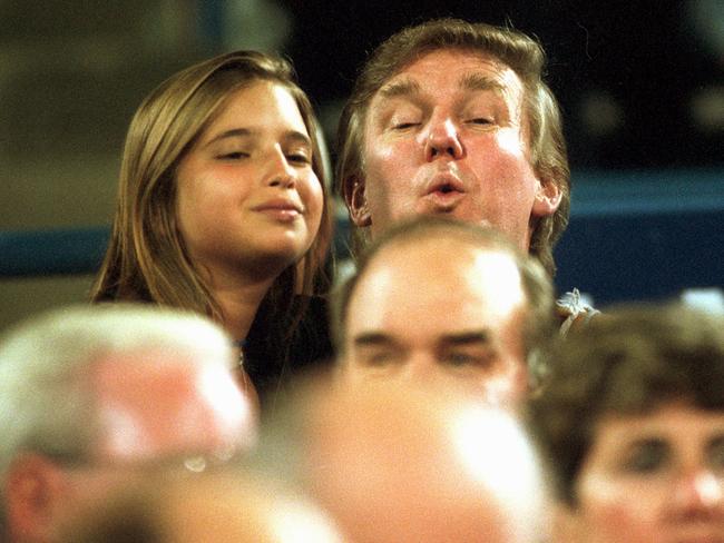 Daddy’s girl ... taking in a game of tennis during the US Open in New York in 1994. Picture: AP/Roh Frehm