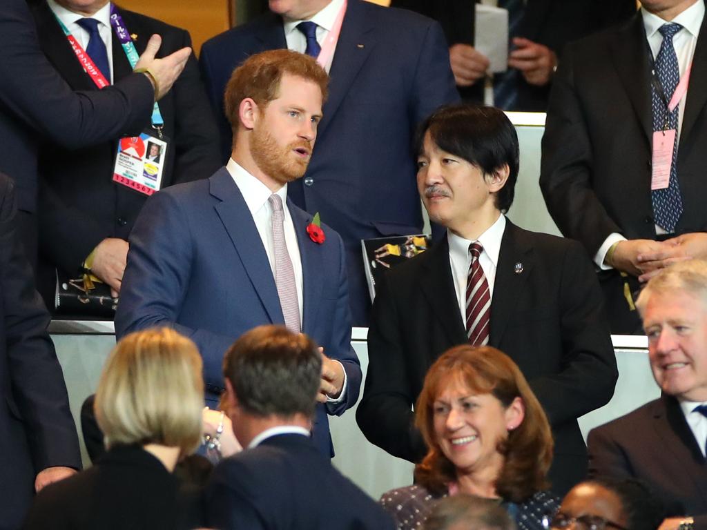 Prince Harry, Duke of Sussex, speaks to Fumihito, Crown Prince Akishino in the stands during the Rugby World Cup 2019 Final. Picture: Getty