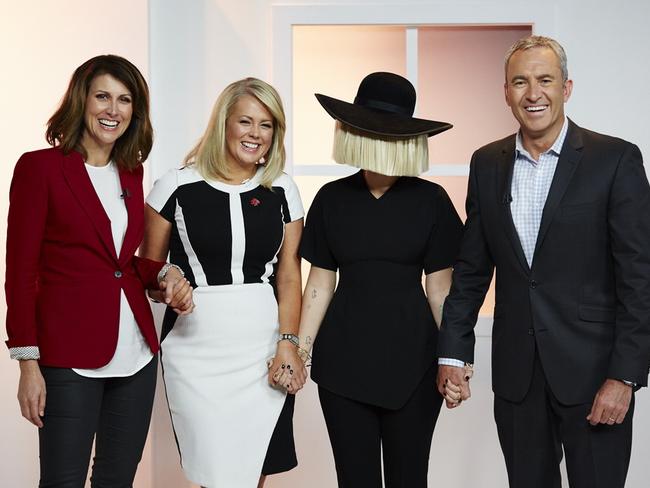 The Sunrise crew held hands with Aussie singer/songwriter Sia.