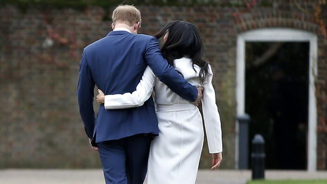 The Duke and Duchess of Sussex, Prince Harry and Meghan, in the grounds of Kensington Palace in London. Picture: AP