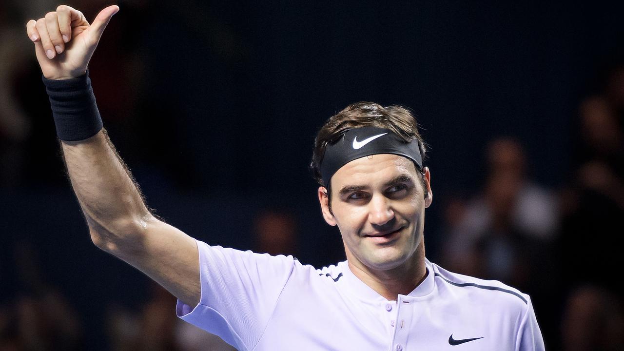 The Australian Open could give Roger Federer his 100th career title. (Photo by Fabrice COFFRINI / AFP)