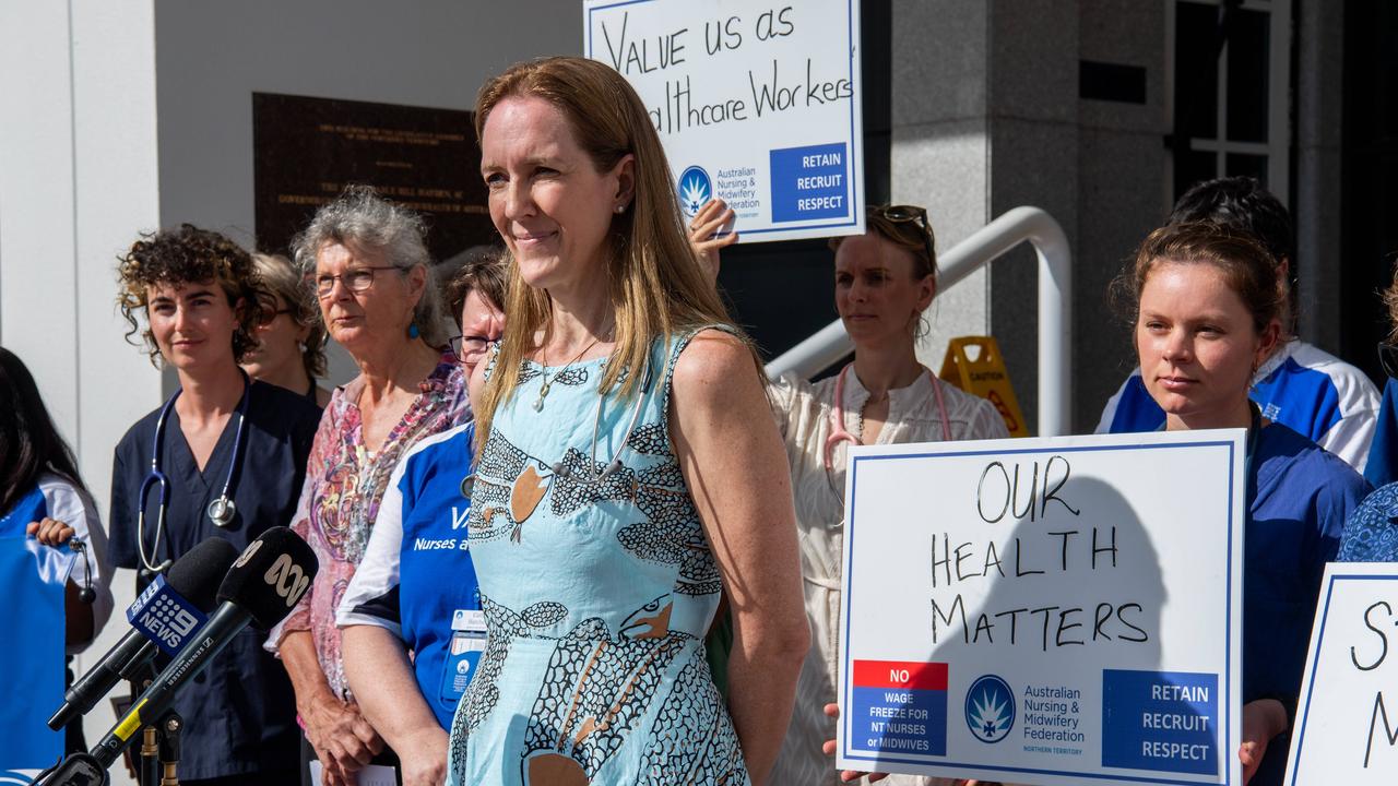 NT pediatrician Louise Woodward, one of a group of Northern Territory health workers protest the Middle Arm Industrial Precinct on the steps of Parliament House. Picture: Pema Tamang Pakhrin