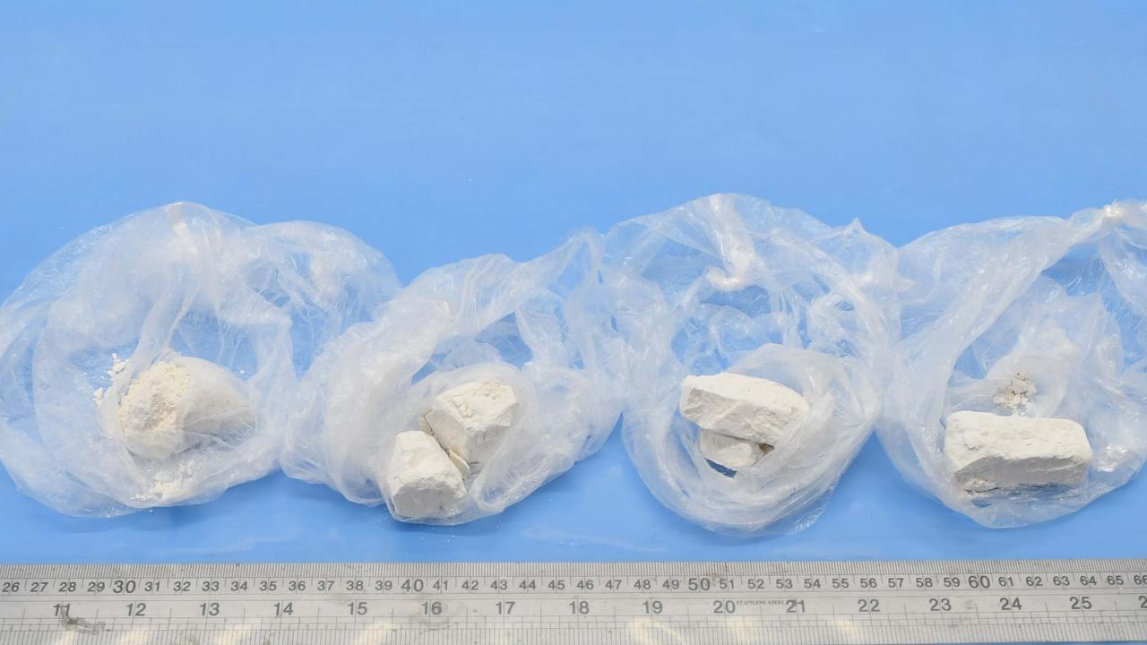 A WA couple excreted 13 pellets containing over $100,000 worth of heroin. Picture: AFP/Supplied.