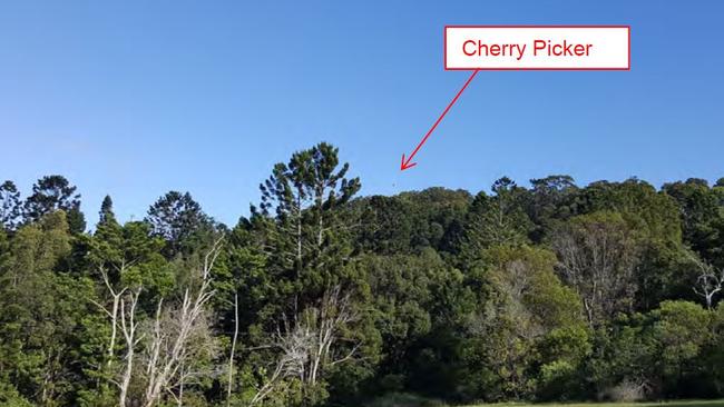 The top of a cherry picker showing the height of a planned mobile phone tower in the Currumbin Valley.