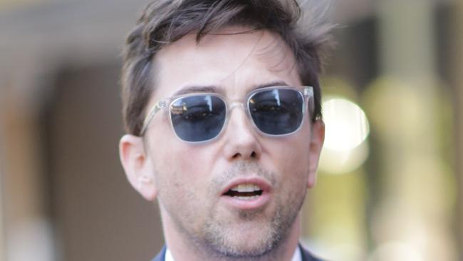 SYDNEY, AUSTRALIA - NewsWire Photos DECEMBER 7, 2020 - Joe Aston, Australian Financial Review columnist, leaves the Federal Court in Sydney after having given evidence this afternoon. Picture: NCA NewsWire / Christian Gilles