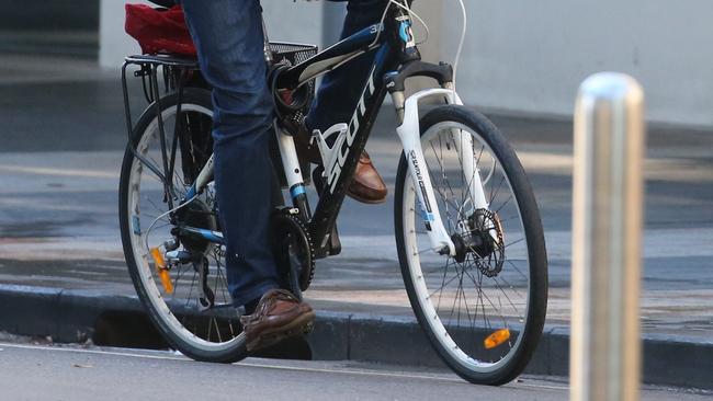 A cyclist has copped a $1000+ fine for using their phone while riding their bike in Cairns.