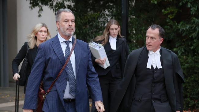Defence team: Bill Doogue, left, and Colin Mandy leave court in Morwell, Victoria. Picture: David Crosling/NewsWire