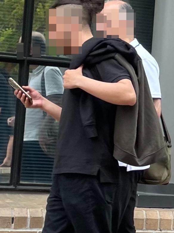 The 19-year-old (left) outside Burwood Court House.