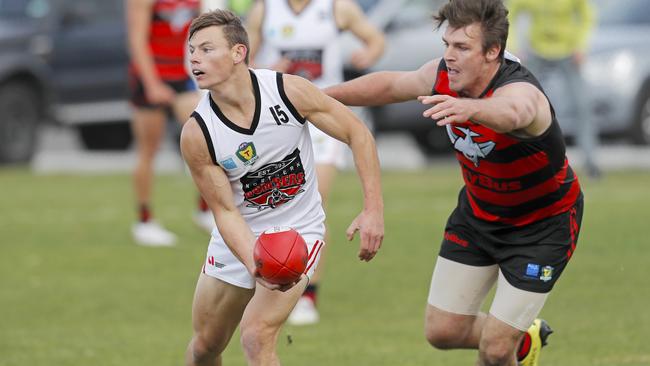 North Launceston's Jack Avent about to be tackled by Lauderdale's Haydn Smith. Picture: PATRICK GEE