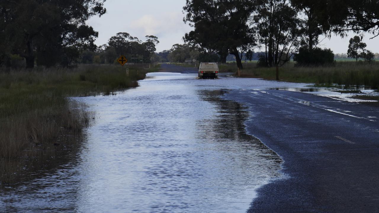 Two cars on McGrane way near Tullamore became submerged on Friday night. Picture: Darren Madsen