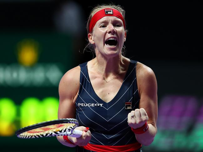 Kiki Bertens celebrates winning match point against Ashleigh Barty.