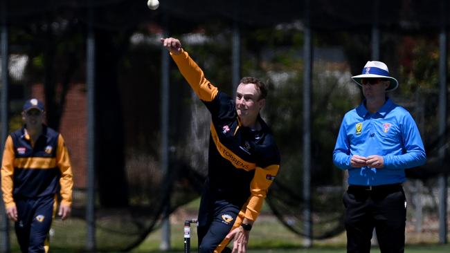 Eagle Daniel Fallins spins one down against East Torrens. Picture: Naomi Jellicoe