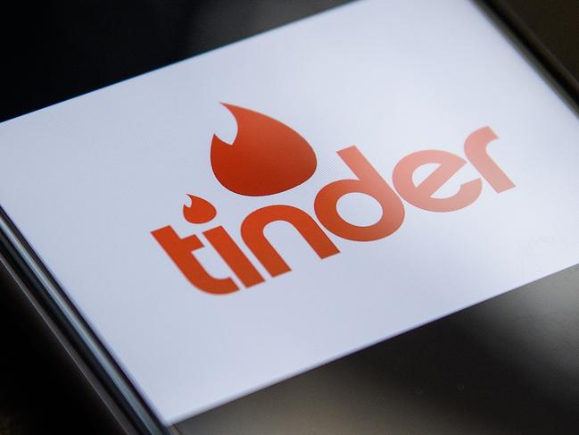 LONDON, ENGLAND - NOVEMBER 24:  The "Tinder" app logo is seen on a mobile phone screen on November 24, 2016 in London, England.  Following a number of deaths linked to the use of anonymous online dating apps, the police have warned users to be aware of the risks involved, following the growth in the scale of violence and sexual assaults linked to their use.  (Photo by Leon Neal/Getty Images)