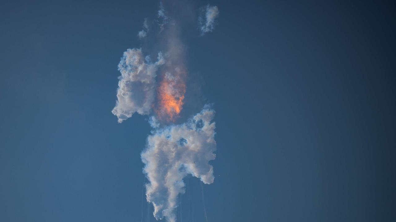 The Starship capsule had been scheduled to separate from the first-stage rocket booster three minutes into the flight but separation failed to occur and the rocket blew up. (Photo by Patrick T. Fallon / AFP)