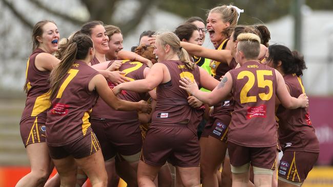 Kew celebrates its premiership win. Picture: Stuart Milligan