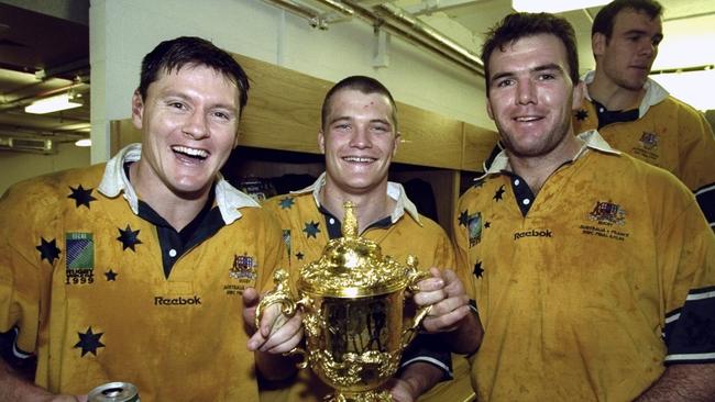 Owen Finnegan (right) helped inspire the Wallabies’ 1999 success.