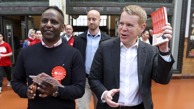 Prime Minister Chris Hipkins, right, tries to make up for lost time on the campaign trail in Wellington. Picture: Getty Images