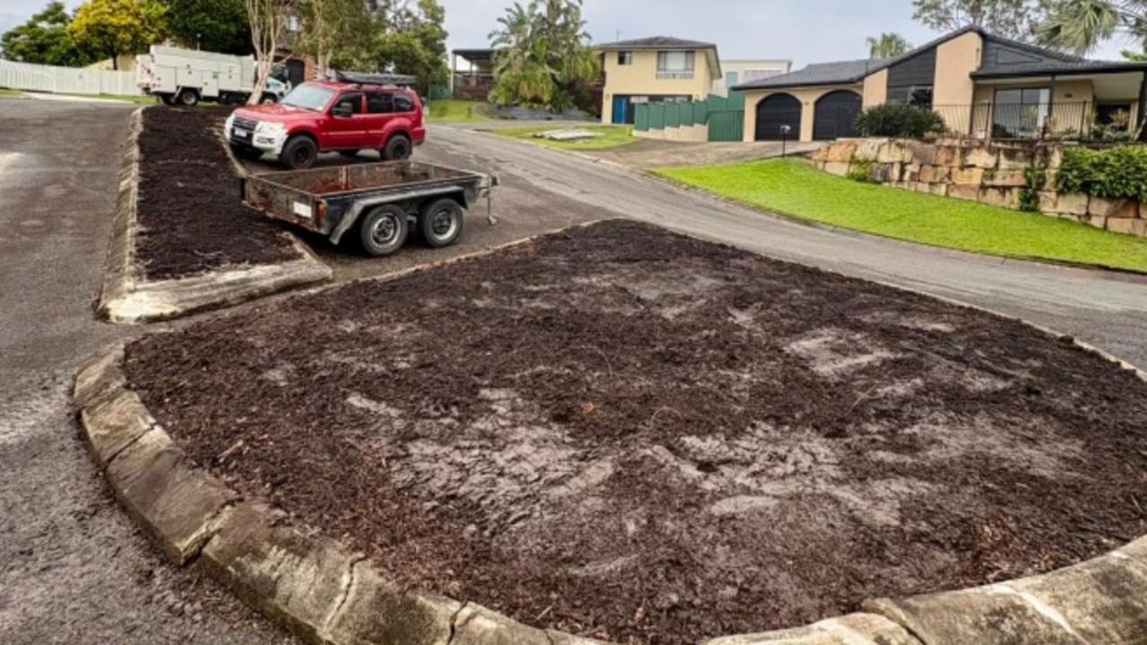The muddy result after council removed plants from a traffic island on a suburban Helensvale street.