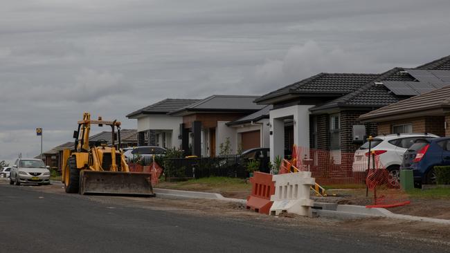 Construction work outside homes in Riverstone. The region is expected to swell over the coming decades. Picture: Nathan Schmidt