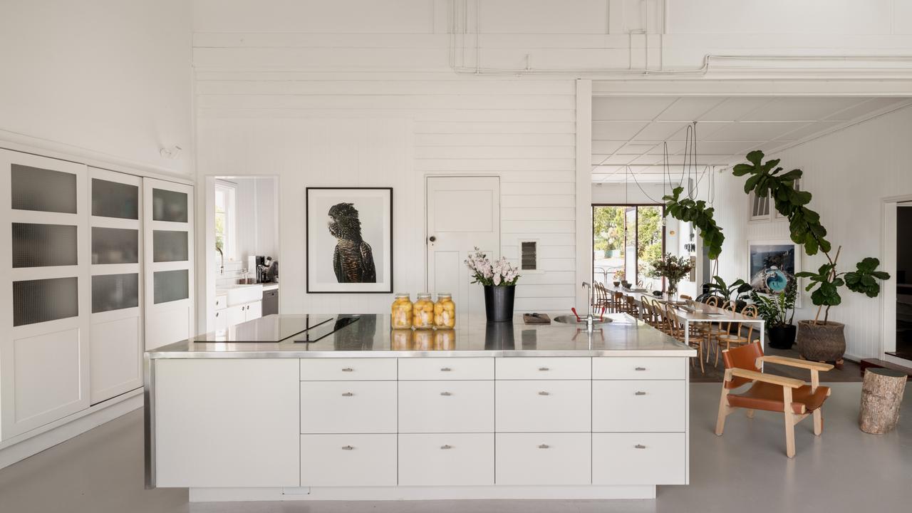 The kitchen has a butler’s pantry and is fitted with high-end appliances