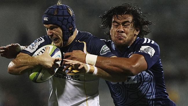 Pat McCabe on the charge for the Brumbies against the Blues.